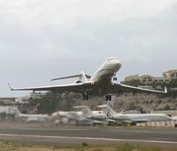 LX-FLY @ TNCM - taking off - by daniel jef