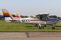G-BTYT @ EGKA - Just started up after going through the preliminaries for another training flight. Previously N24931. Owned by Cristal Air Ltd. Operated by Sussex Flying Club Ltd. - by Glyn Charles Jones