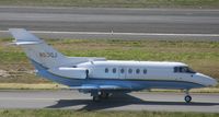 N50QJ @ TNCM - taxing runway 10