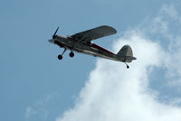 N4026V @ S50 - flying under the clouds, on final