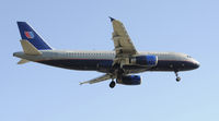 N466UA @ KLAX - Landing 24R at LAX - by Todd Royer