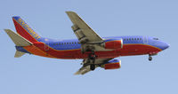 N520SW @ KLAX - Landing 24R at LAX - by Todd Royer