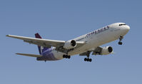 N581HA @ KLAX - Landing 24R at LAX - by Todd Royer