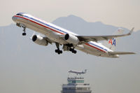 N617AM @ KLAX - Departing LAX on 25R - by Todd Royer