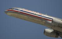 N678AN @ KLAX - Departing LAX on 25R - by Todd Royer