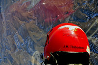 N254SF @ KAPA - Looking straight down to the ground over Joe's shoulder over the top - by John Little