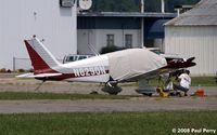 N8290N @ PVG - Just a little powerplant attention... - by Paul Perry