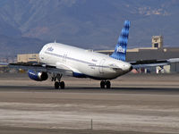 N641JB @ KLAS - jetBlue Airways - 'Blue Come Back Now Hear' / 2006 Airbus A320-232 - by Brad Campbell