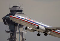 N946AN @ KLAX - Departing LAX on 25R - by Todd Royer