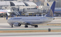 N34222 @ KLAX - Taxi to gate - by Todd Royer