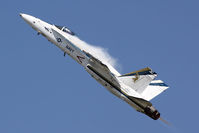 164630 @ LFI - USMC McDonnell Douglas F/A-18C Hornet 164630 from VFA-106 Gladiators in a special commemorative scheme (1979-2008) performing a high-g maneuver in the Hornet Demo. - by Dean Heald