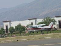 N21643 @ POC - Gusting wind makes landing tricky - by Helicopterfriend