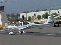 N217DS @ POC - Parked and tied down at Brackett transient parking - by Helicopterfriend