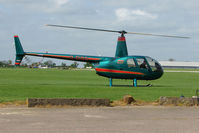 G-DIGG @ EGBK - Robinson R44II At Sywell in May 2009 - by Terry Fletcher