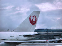 JA8179 @ RJAA - Watching the tail of a JAL Boeing 767 parked at Narita Tokyo Airport - by CiccioNutella