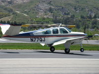 N77QJ @ SZP - 1967 Beech V35A BONANZA, Continental IO-520-B 285 Hp, flap landing Rwy 22 - by Doug Robertson