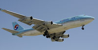 HL7489 @ KLAX - Landing 24R at LAX - by Todd Royer