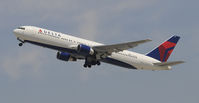 N176DN @ KLAX - Departing LAX on 25R - by Todd Royer