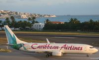9Y-ANU @ TNCM - taxing runway 10