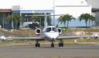 N25RE @ TNCM - taxing runway 10 - by daniel jef