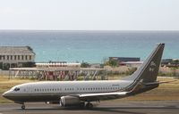 N88WR @ TNCM - taxing runway 10 - by daniel jef