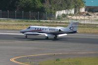N595PL @ TNCM - Landing 10