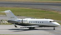 N831ET @ TNCM - taxing runway 10