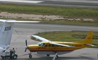 N900HL @ TNCM - on the tow at the caro ramp