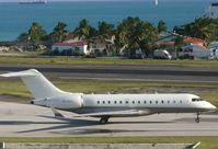 VP-BVG @ TNCM - taxing runway 10