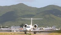 N90AM @ TNCM - taxing runway 10 - by daniel jef