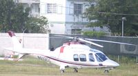 N613CC @ TNCM - At the helipad - by daniel jef