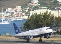 N656JB @ TNCM - take off runway 09