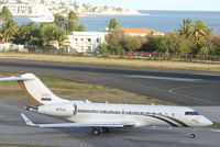 N171JJ @ TNCM - taxing runway 10 - by daniel jef