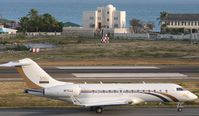 N171JJ @ TNCM - taxing runway 10 - by daniel jef