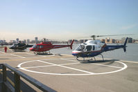 N614CL - Pleasure flight Helicopters lined up and ready to go. - by Andrew Simpson
