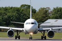 TS-INI @ EGCC - Nouvelair operating for Libyan Airlines - by Chris Hall