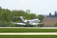 N424QS @ CID - Departing Runway 27