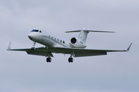 N595E @ EGCC - Previous ID: N900GB - by Chris Hall