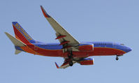 N200WN @ KLAX - Landing 24R at LAX - by Todd Royer