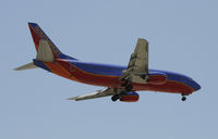 N307SW @ KLAX - Landing 24R at LAX - by Todd Royer