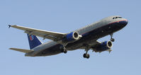N466UA @ KLAX - Landing 24R at LAX - by Todd Royer