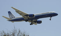 N502UA @ KLAX - Landing 24R at LAX - by Todd Royer