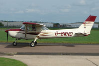 G-BWND @ EGBW - Cessna 152 at Wellesbourne in new colours - by Terry Fletcher