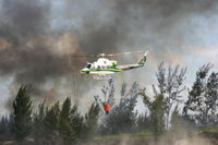 N911RA @ MIA - CHOPPER EXTINGUISHES FIRE  SR-836 - by Anuor