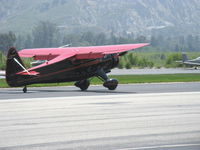 N999WT @ SZP - 1943 Howard DGA-15P 'Black Bear', P&W R-985 Wasp Jr. 450 Hp, landing roll Rwy 22 - by Doug Robertson