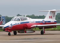 114009 @ BAD - Parked in line with the other Snowbirds waiting on the weather to clear up at The Defenders of Liberty Airshow 2009 at Barksdale Air Force Base, Louisiana. - by paulp