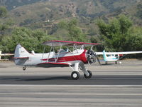 N32135 @ SZP - 1941 Waco UPF-7, Continental W670 220 Hp, a stunning showplane, wheel landing roll Rwy 22 - by Doug Robertson