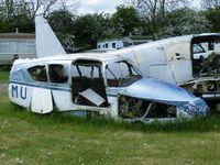 G-ATMU @ EGSP - The remains of an Apache at Sibson, the one behind is G-ARBN - by Simon Palmer