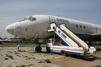 N220RB - DC-8-21  Located at Datangshan, China - by Mark Pasqualino