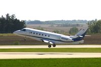 N602AB @ CID - Departing Runway 13 - by Glenn E. Chatfield